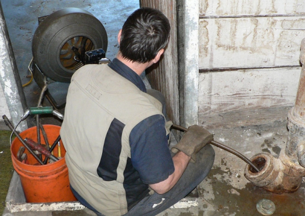 Retrieve item dropped in drain near Milwaukee